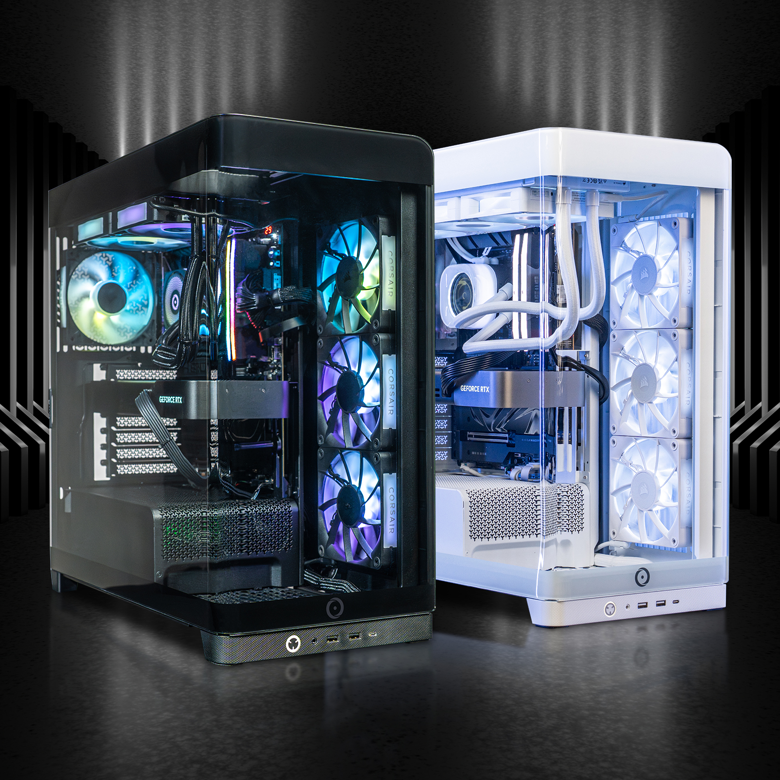 Two ORIGIN PC NEURON gaming desktops in black and white, shown with illuminated internal components, RGB fans, liquid cooling, and tempered glass panels.
